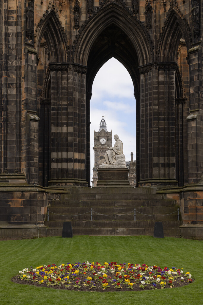 Sir Walter Scott sits below his monument….   by billdavidson