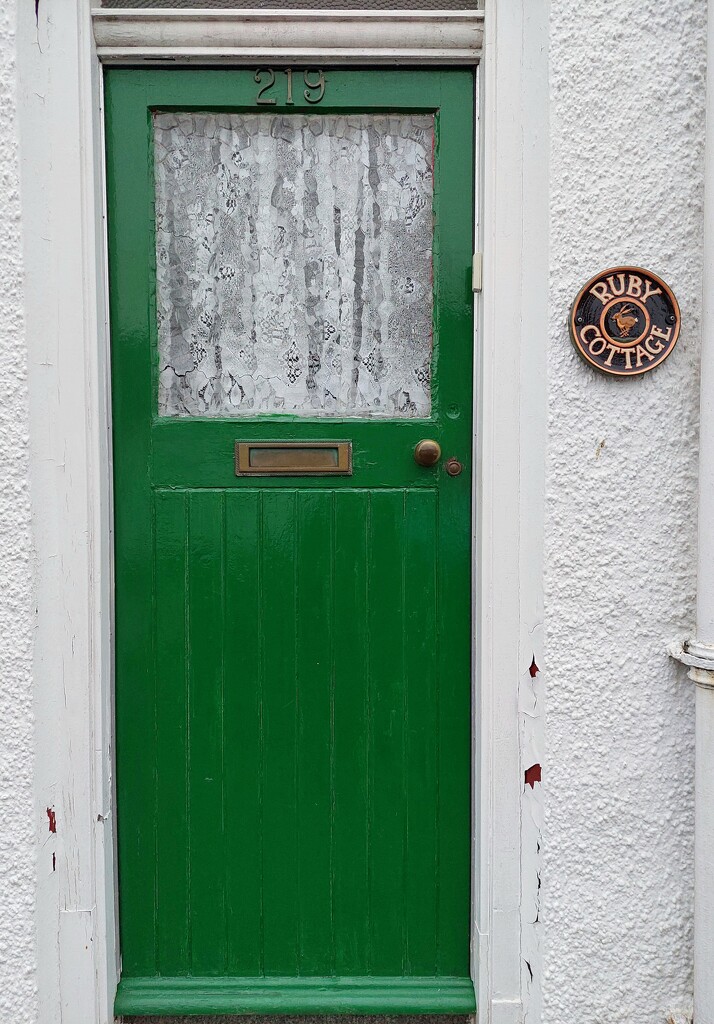 I like the door and we have a wall plaque made by the same potter  by samcat
