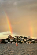 30th Apr 2023 - Quick shot of a double rainbow and sailing dinghy on Sydney Harbour. Taken from the ferry at sundown. 