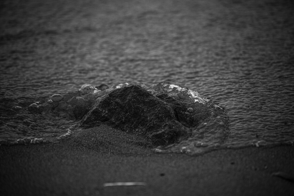 rock in sand by darchibald
