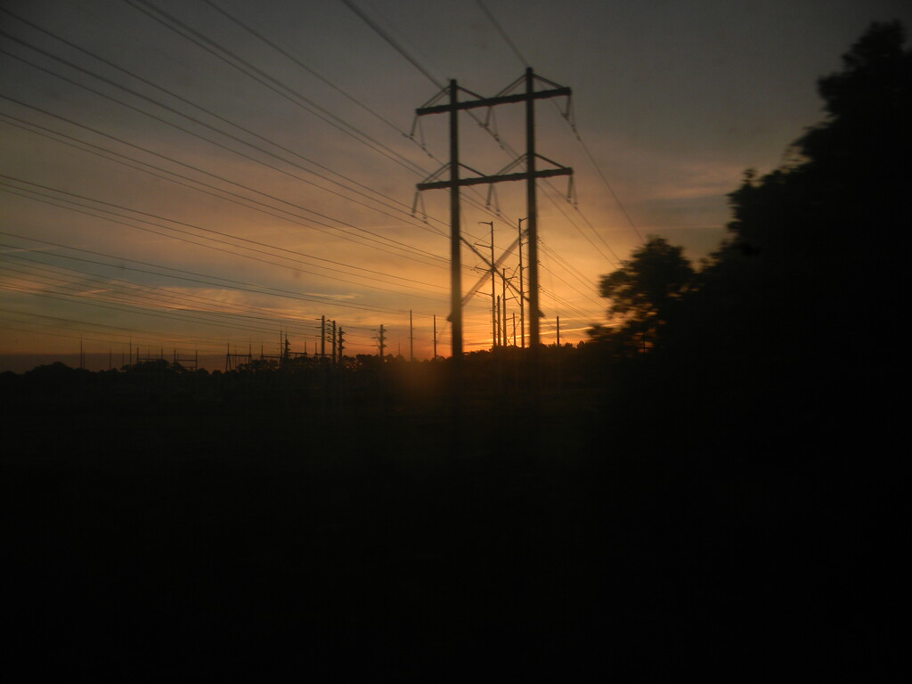 Sunrise from Train Window  by sfeldphotos