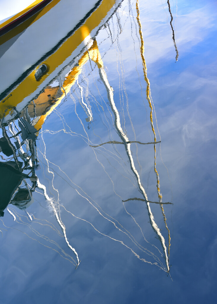 Yellow Boat Reflection by clearlightskies