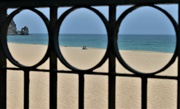17th May 2023 - Through the promenade railing - a quiet family scene
