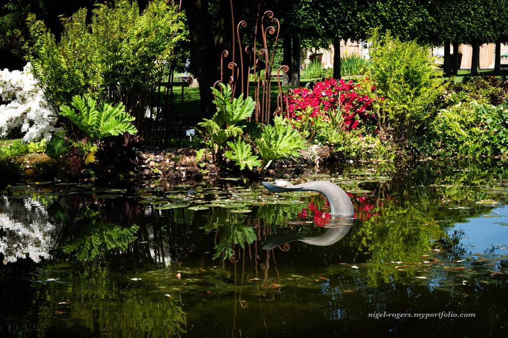 Reflections in the sculpture garden by nigelrogers