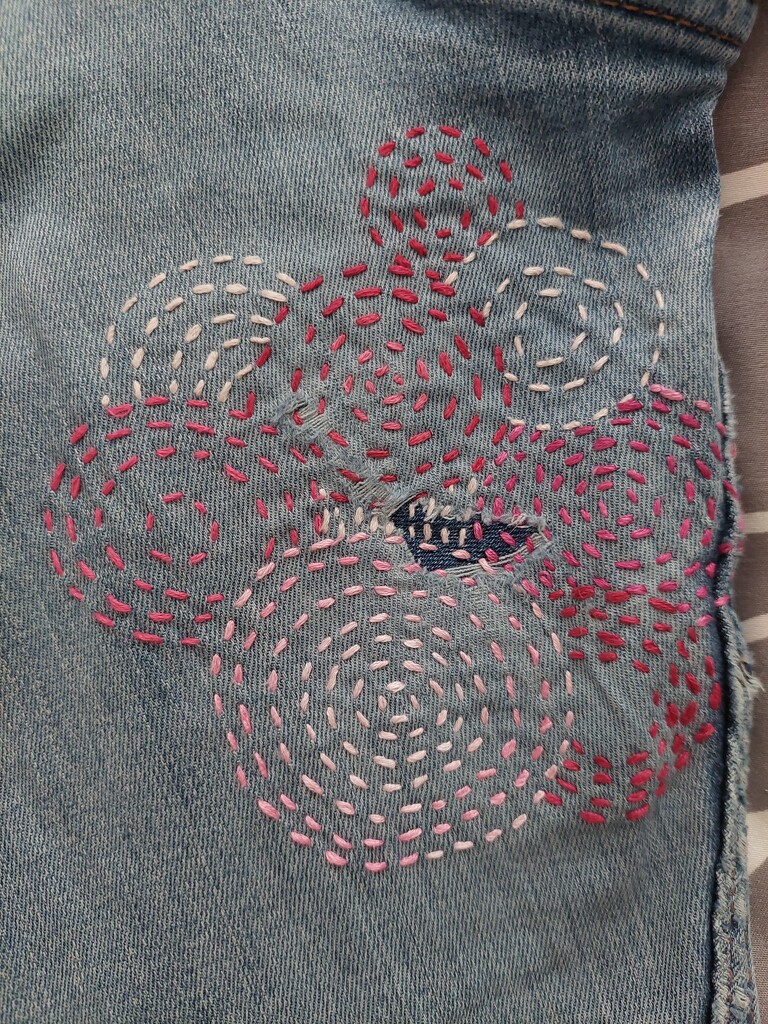 My first attempt at visible mending on my jeans  by samcat