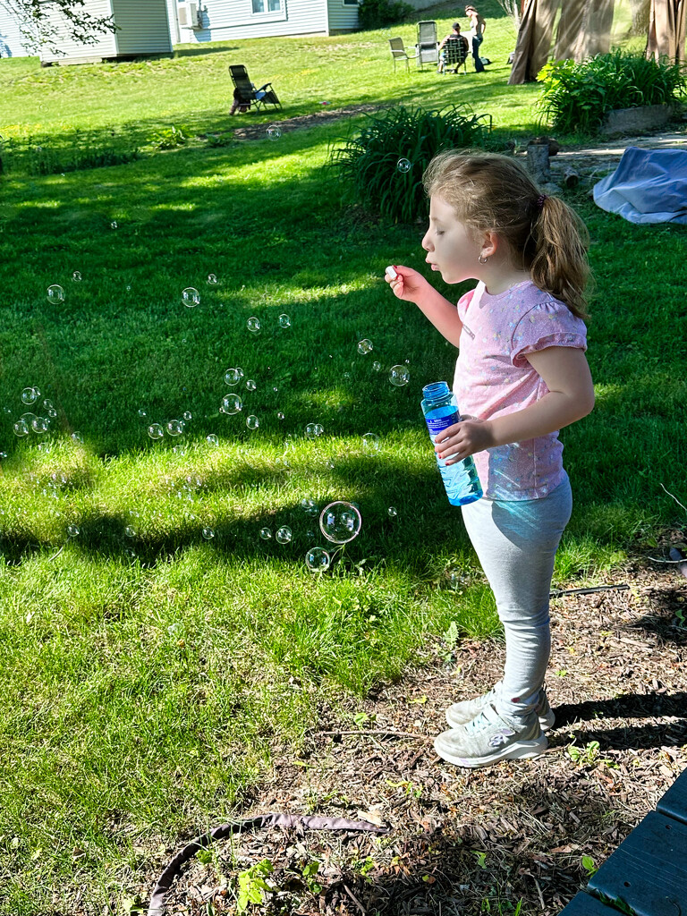 Sophia blowing bubbles by joansmor