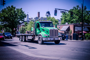 29th May 2023 - Truck hauls detritus through uptown intersection @ College
