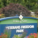 Mockingbird on Veterans Freedom Park Sign  by sfeldphotos