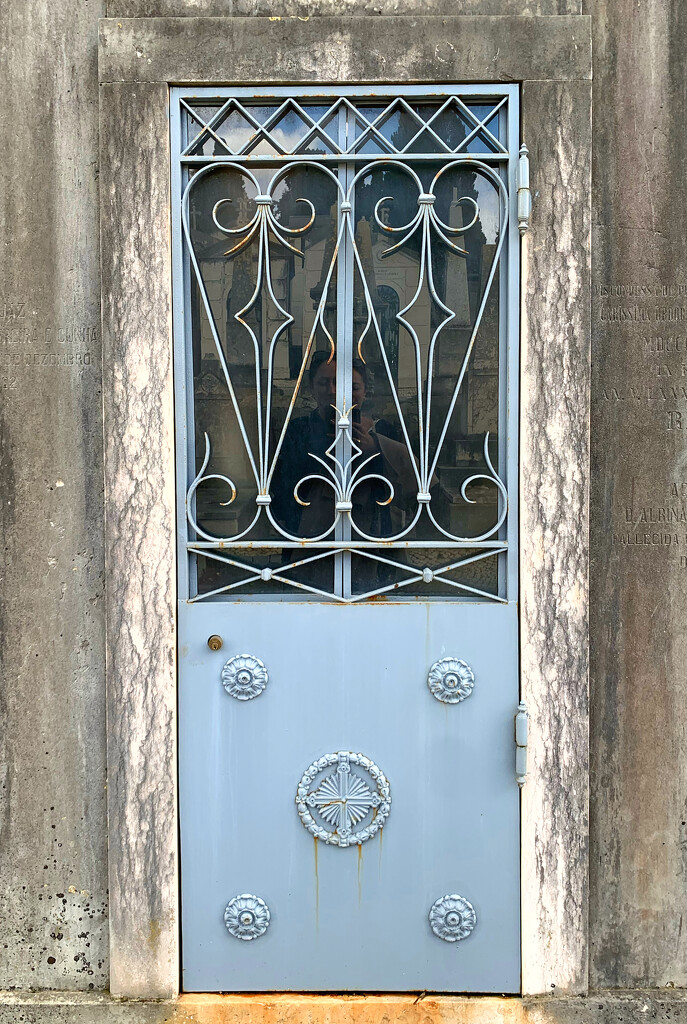 Two hearts on metal blue door.  by cocobella