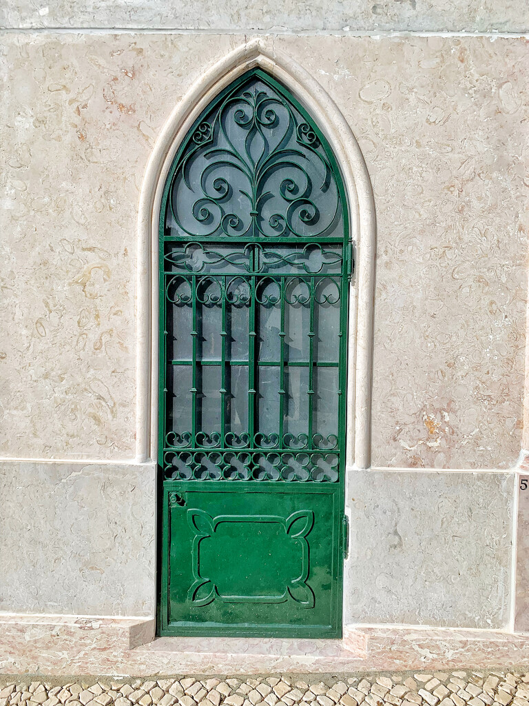 Nine hearts on green door.  by cocobella