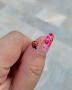 14th Jun 2023 - Ladybug loves my dots nails.  