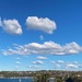 Blue sky and fluffy clouds from the lounge room window.  by johnfalconer