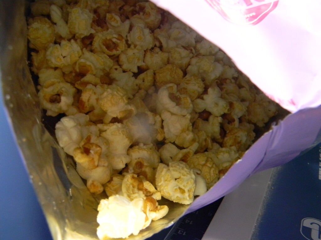 Bag of Popcorn  by sfeldphotos