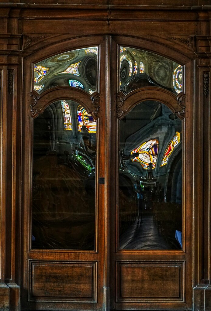 0622 - Reflections in a church door by bob65