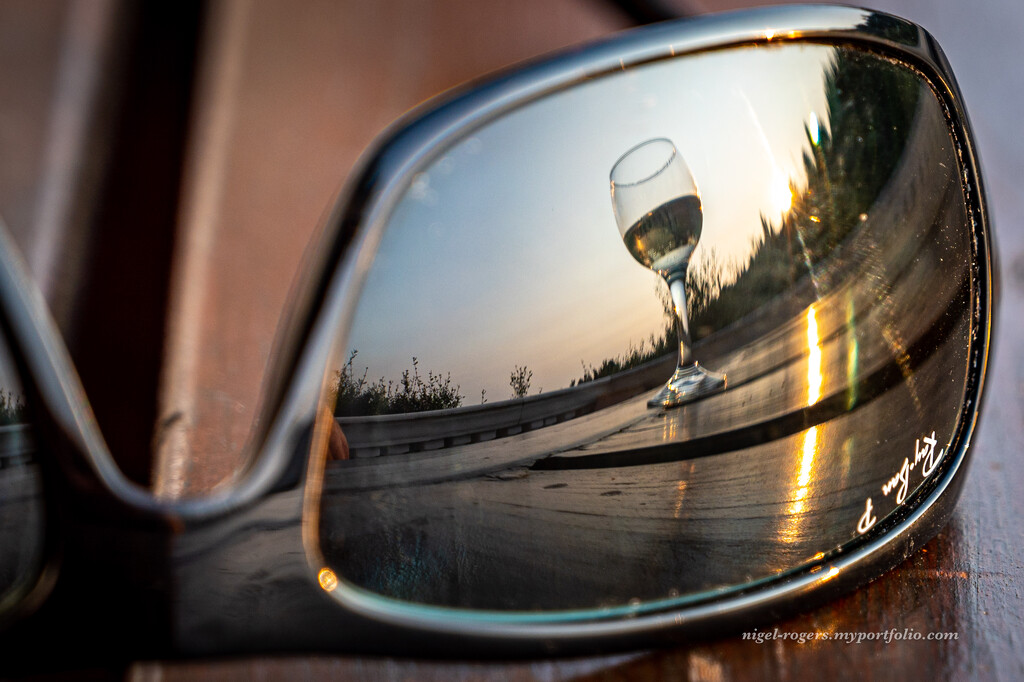 Sunglasses, wine and sunset by nigelrogers