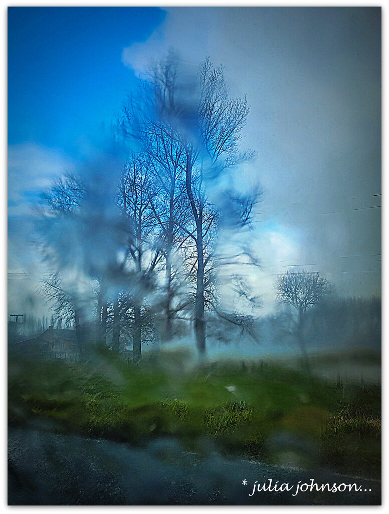 Blue sky through the torrential rain.. by julzmaioro