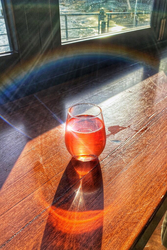 Another glass of lovely rose at the end of the rainbow for me to enjoy in the  sunshine. The little rainbow is very real and not from somewhere else!! by johnfalconer