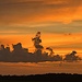 I see a genie in the clouds at sunset  by congaree