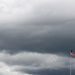 Atmospheric sky with a flag by mittens