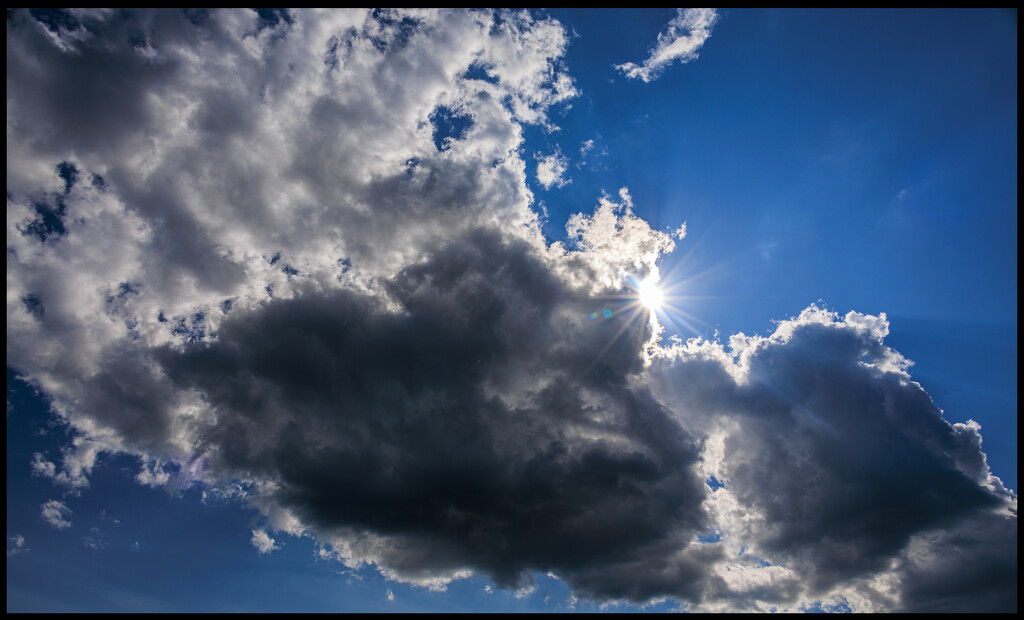 Sunburst, Clouds, and Sky by hjbenson