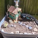 The beginning of a fairy garden.  by scoobylou