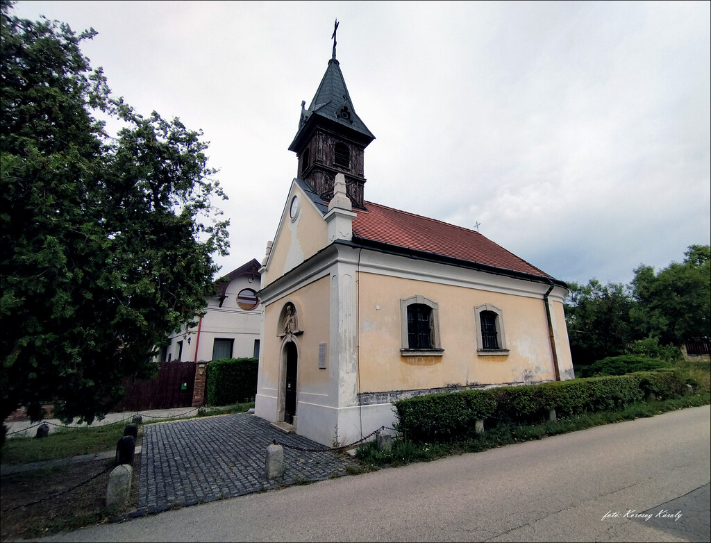 A chapel with a wooden tower by kork
