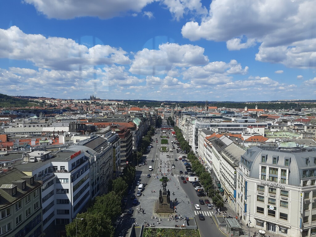 Wenceslas Square and Prague Castle in the back by solarpower