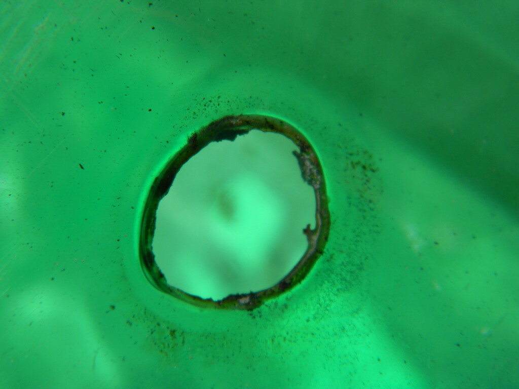 Hole in Green Bottle  by sfeldphotos