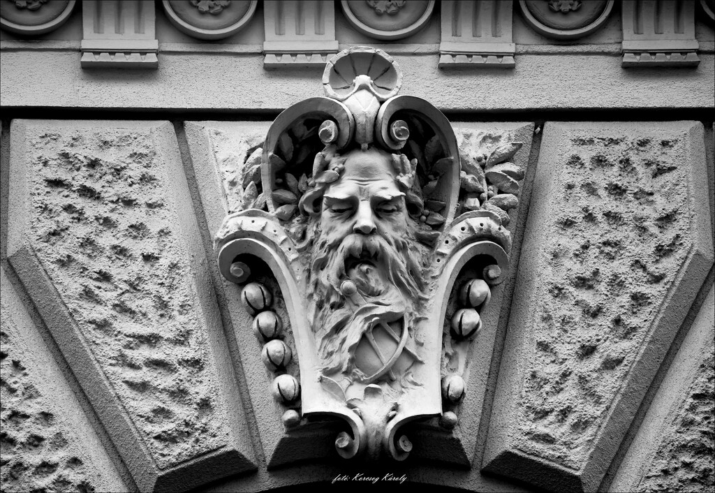 Faces of Budapest houses by kork