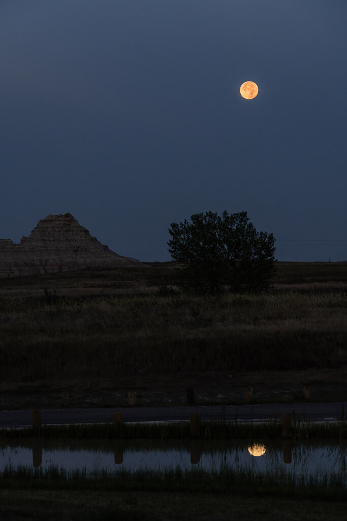 Full Moonset in the Badlands by k9photo