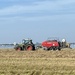 Making hay while the sun shines.