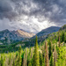 Stormy Skies Over the Rockies by kvphoto