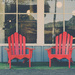 Two red cape cod chairs
