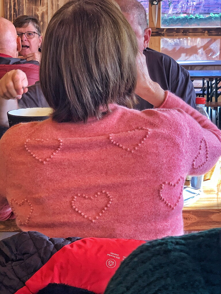Pink hearts on a pullover.  by cocobella