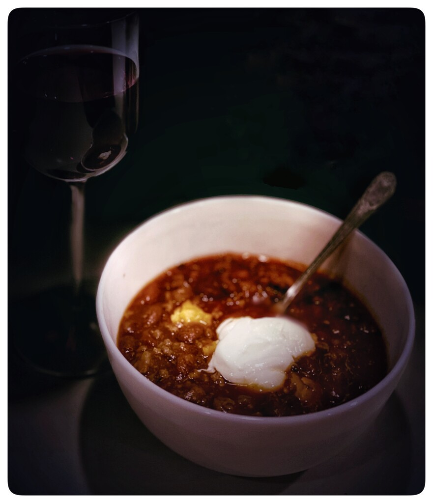 Warm bowl of Chili and a glass of Pinot Noir by eahopp
