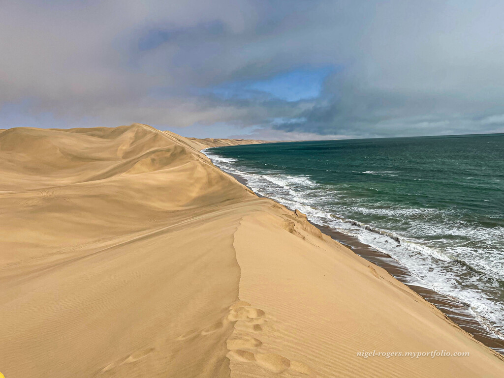 Sand dunes meet the sea by nigelrogers