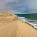 Sand dunes meet the sea by nigelrogers