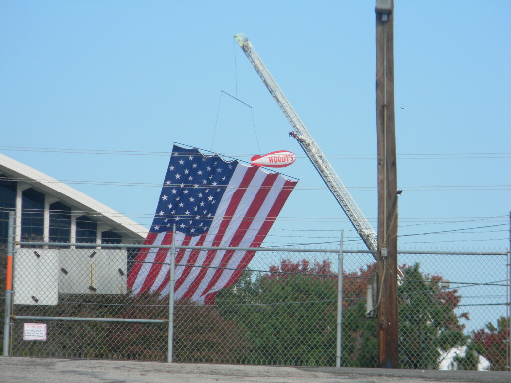 American Flag, Blimp and Crane by sfeldphotos