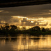 Sunset under Rangiriri Bridge by nickspicsnz