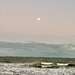 Early evening moon over ocean by congaree
