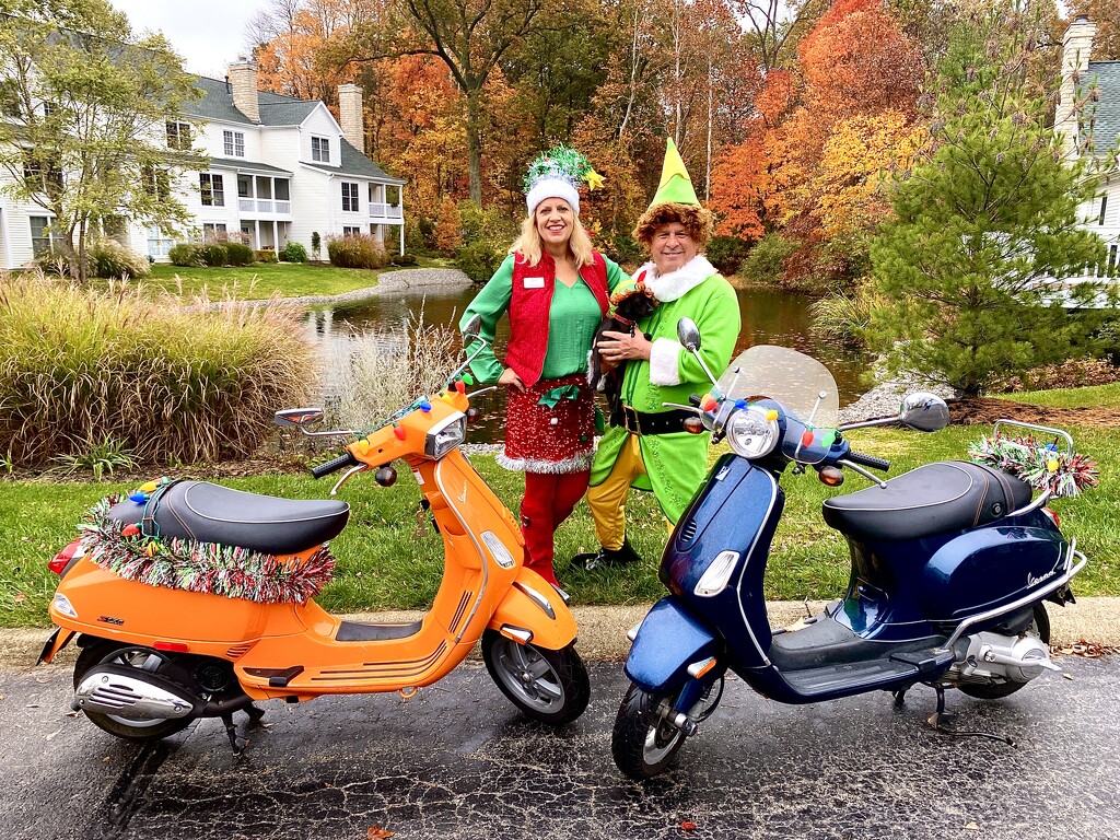 Elf and Buddy pose with their Vespas and miniature dog named Brody by ggshearron
