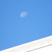 Moon over Top of Building  by sfeldphotos