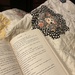 Reading and stitching by margonaut