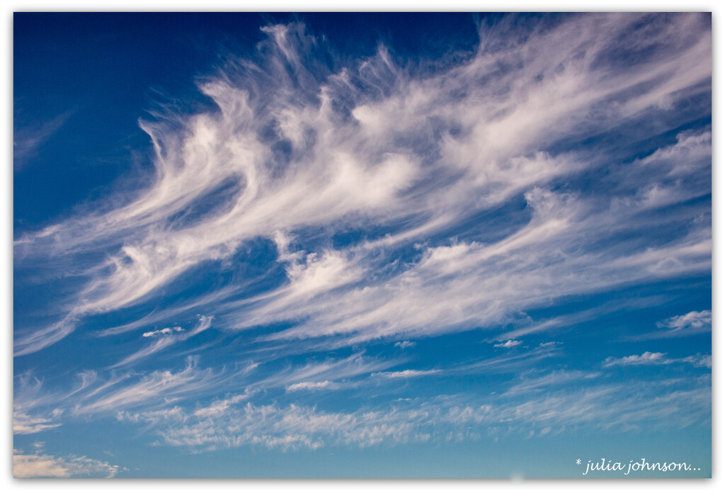 Mares Tails.. Cirrus Clouds.. by julzmaioro
