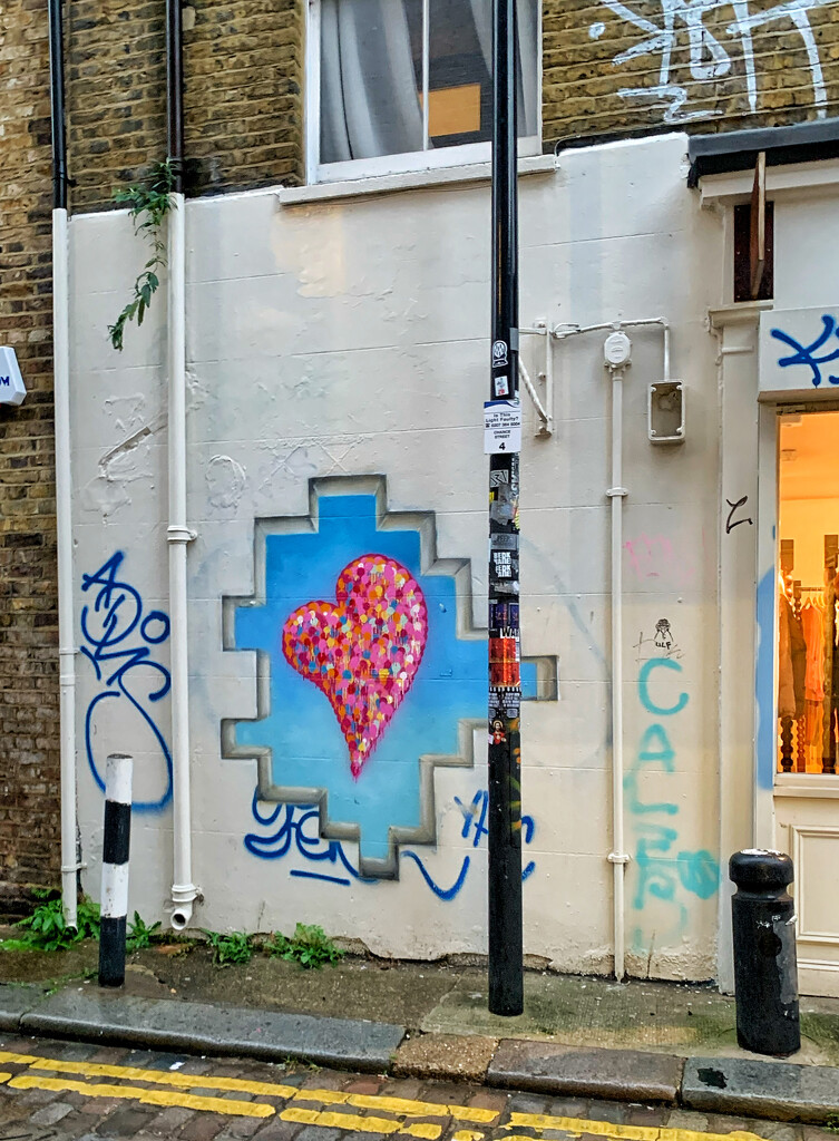Pink heart on a wall.  by cocobella