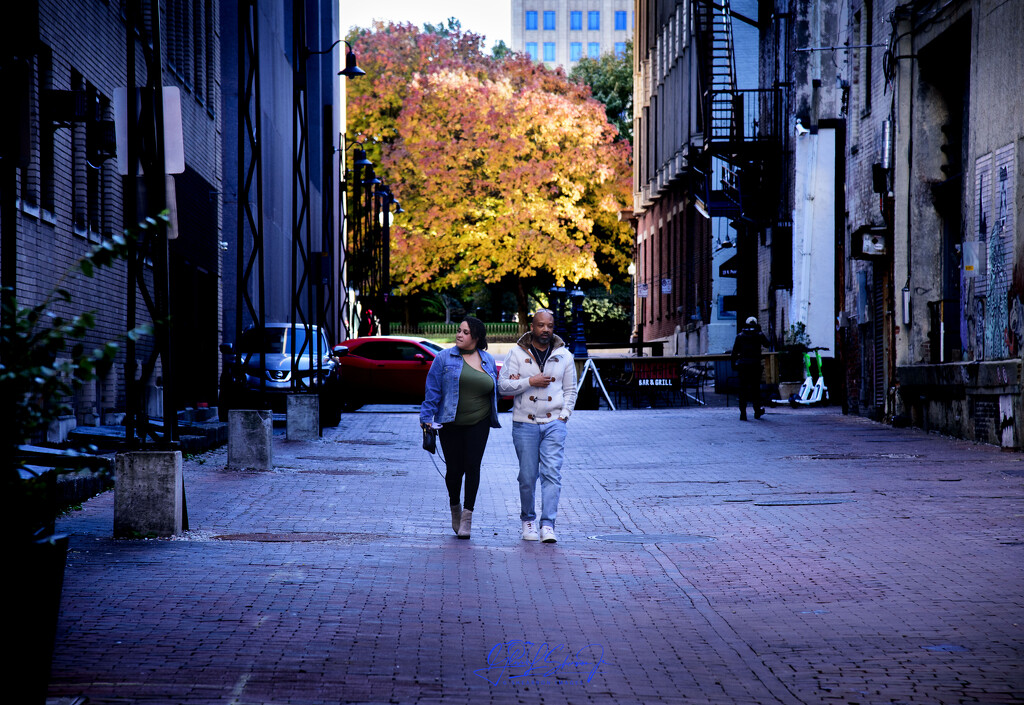 Couple enjoys a walk in downtown Columbus  by ggshearron