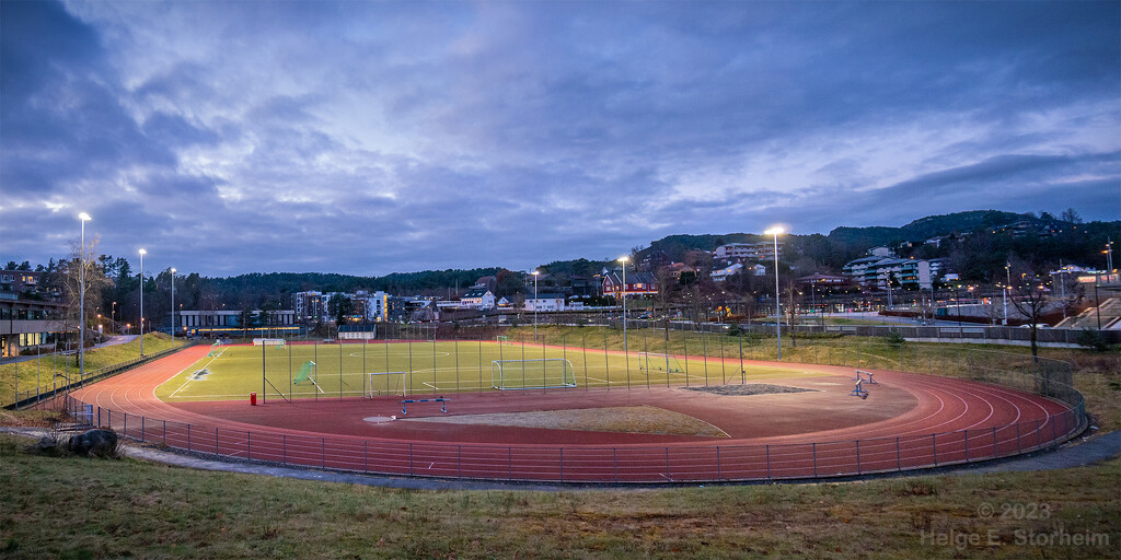 Soccer field with running track by helstor365