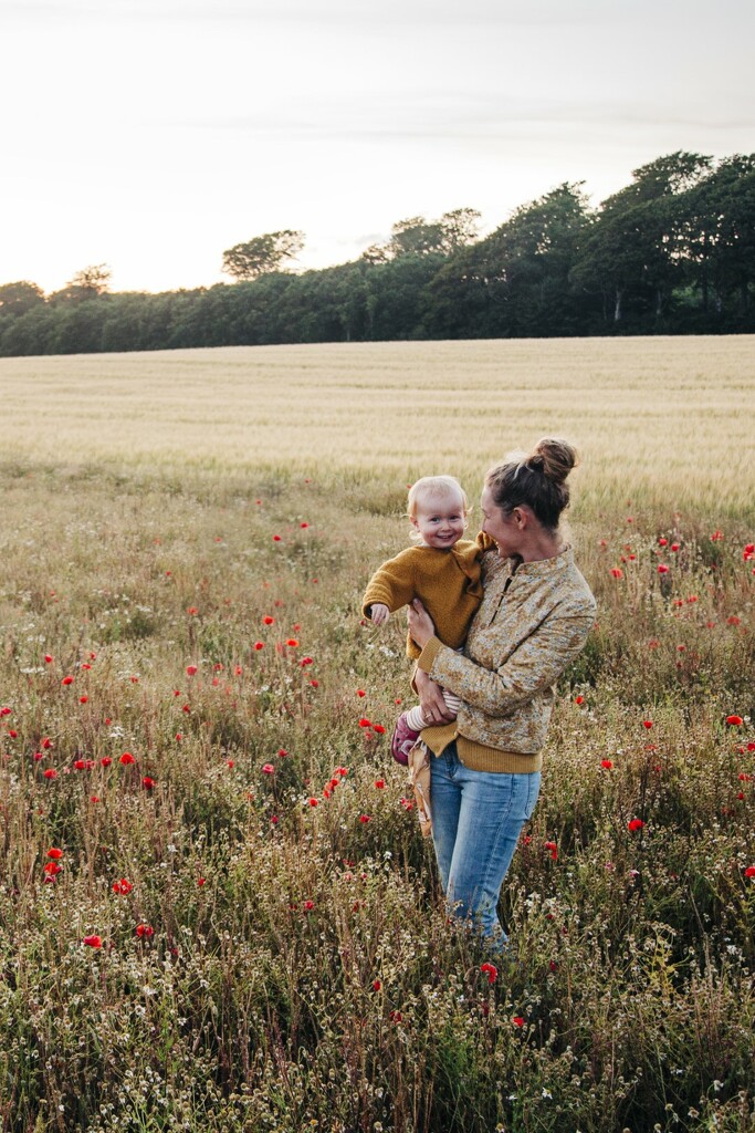 In the poppies with my little babe  by lily