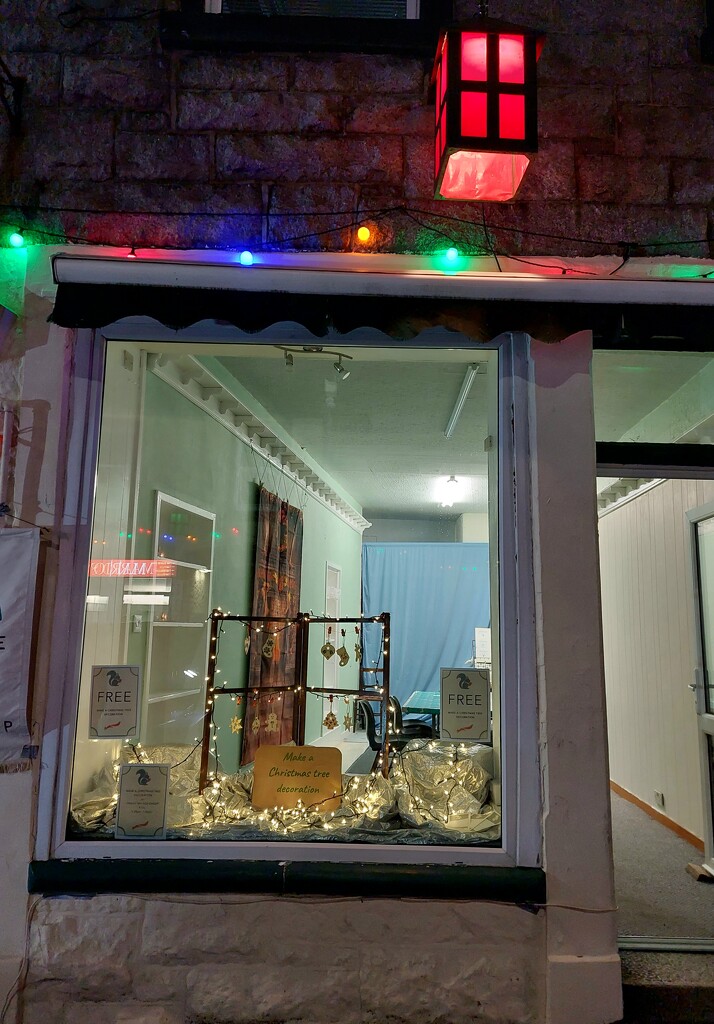 The shop just after the Christmas lights were switched on by samcat