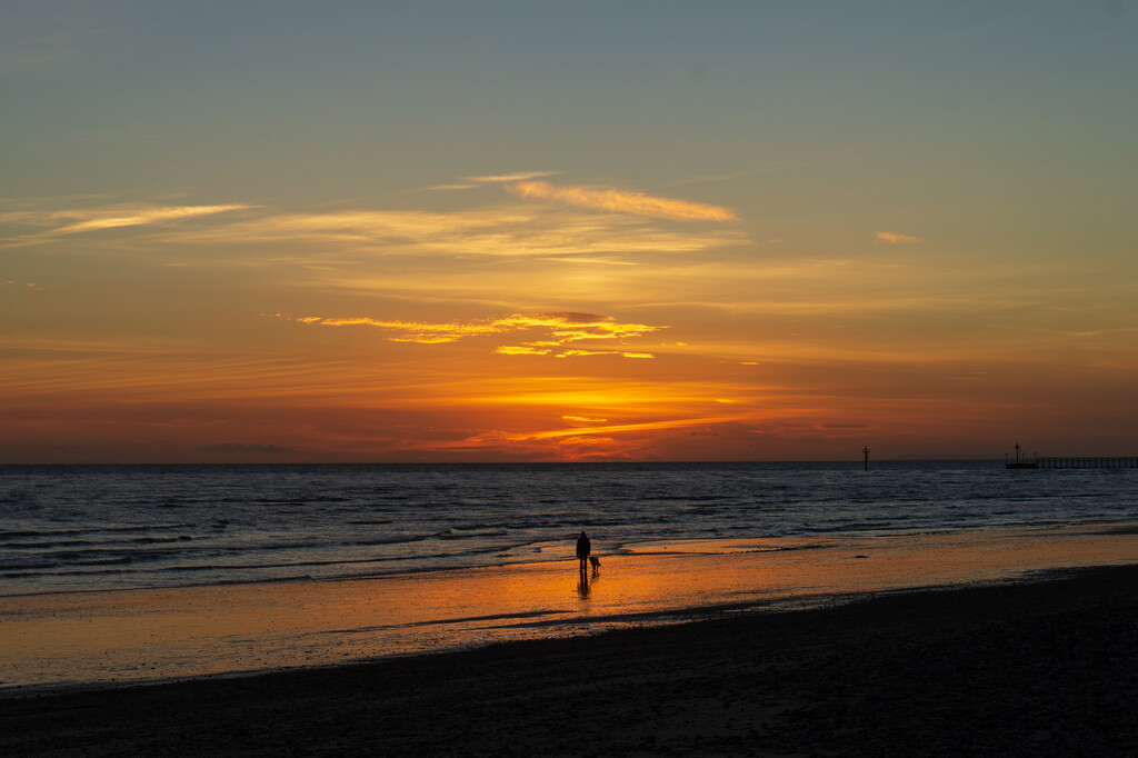 Walking the dog at sunset by josiegilbert